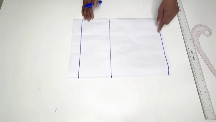 Place half your shoulder measurement on the starting line. Go down by an inch and connect to the neck width to form the shoulder line.