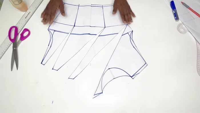 Cut out the armhole and neckline of the front pattern.