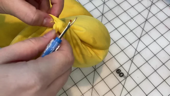 Stuff the frog with filling (beanies and/or cotton fluff).