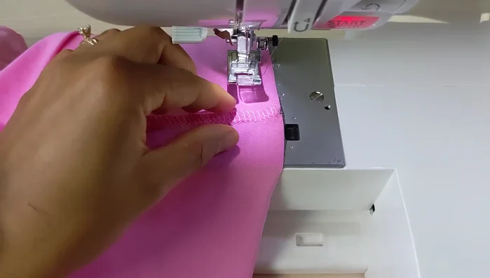 Hem the dress. Fold 3/8 inch (1 cm) hem, sew with a zigzag stitch or double needle (for a more professional look).