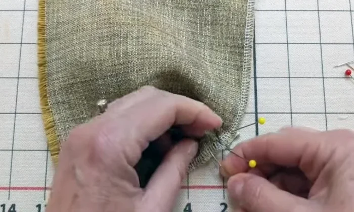 Pin the pleats in place to secure them before sewing (optional, but recommended for beginners).