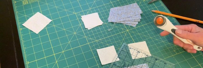 Cut two 2-inch squares for the geese.