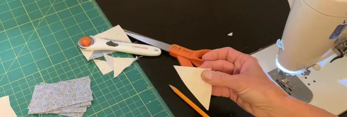 Sew along the pencil lines.