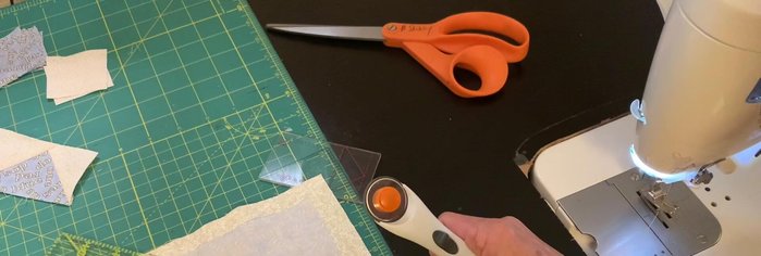 Cut along the pencil line to create two half-square triangles.