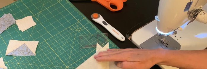 Sew on both sides of the pencil line.