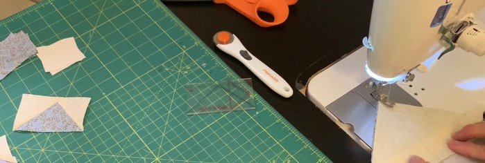 Sew on both sides of the pencil line.