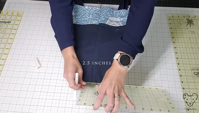 Box the corners by cutting off the excess fabric and sewing the corners.