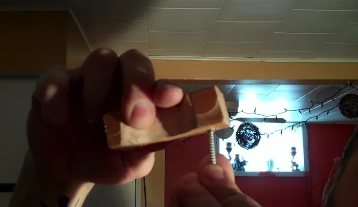 Attach the brackets to the pipe using screws.