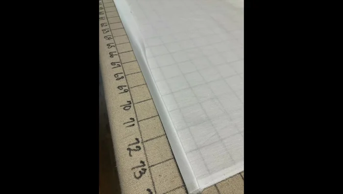 Hem deck fabric: Create a double half-inch hem on the top edge (headboard end) of the deck and topstitch.