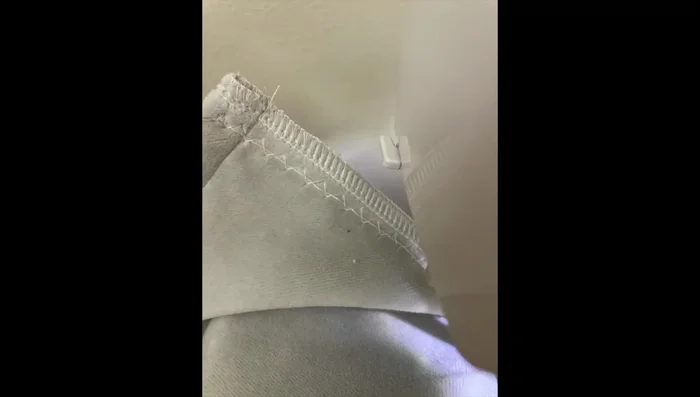 Gather bed skirt: Using a zigzag stitch over a strong cord, gather three sides of the bed skirt.