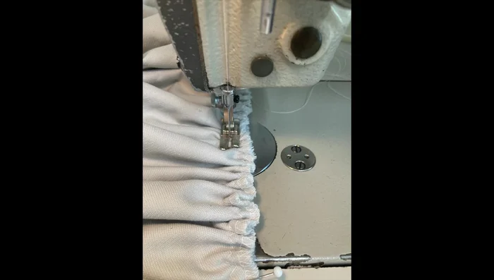 Sew: Sew the bed skirt to the deck, carefully adjusting gathers as needed. Stitch approximately three-quarters of an inch from the edge.