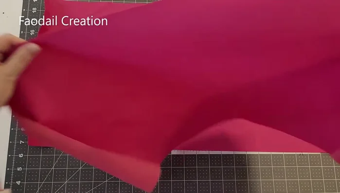 Create a hem on the shorter sections of the fabric by folding and stitching.