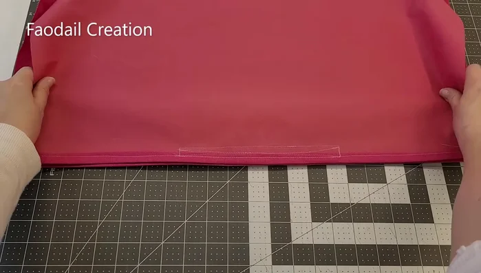 Place the two back sections right sides together, matching the velcro. Sew around the edges, leaving no opening because of the velcro closure.