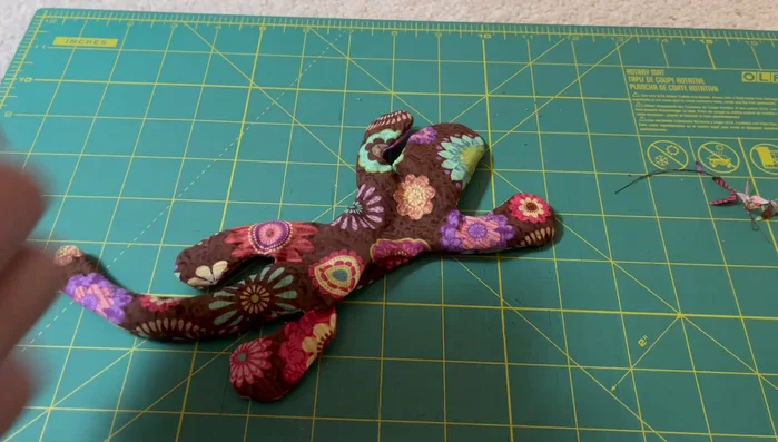 Stuffing: Fill the fabric with stuffing material.