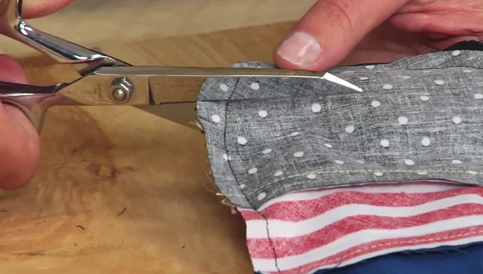 Turn and stuff: Turn the doll right side out and stuff with fiberfill. Hand-stitch the opening closed.