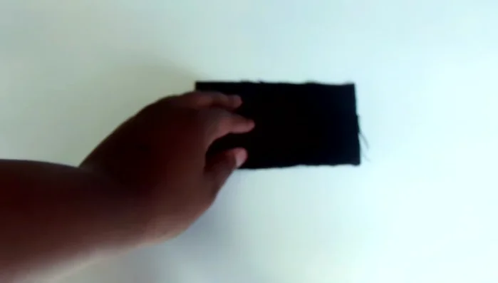 Cut fabric flaps: Cut eight fabric flaps (two inches long, half an inch wide) for each shoe.