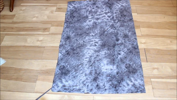 Cut the fabric according to the calculated dimensions.