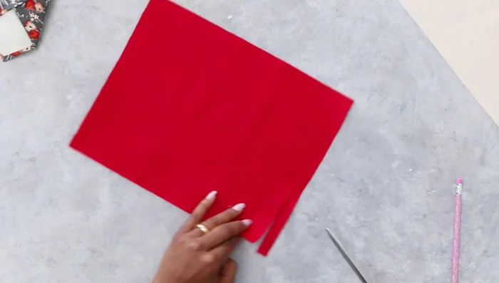 Cut and glue a red felt tongue.