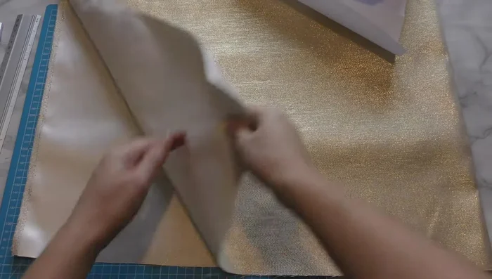 Cut out fabric pieces using the provided pattern. Place patterns in alternating directions to maximize fabric use.