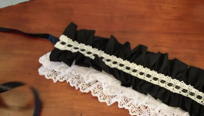 Make bows from ribbon and hand-sew them to the sides of the headband.