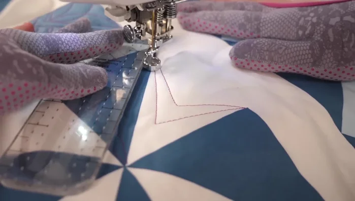Use stitching in the ditch to smoothly transition between sections and connect your curves.