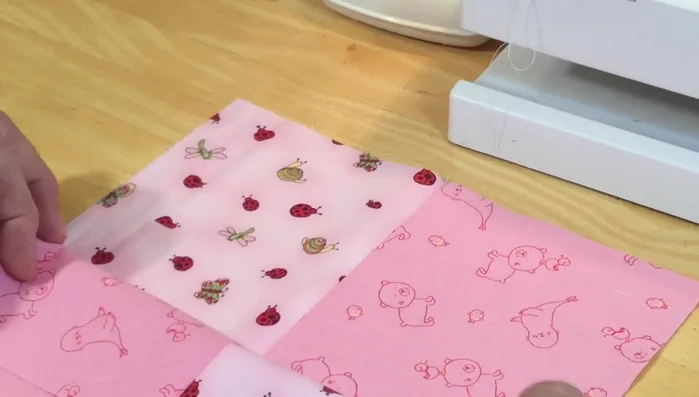 Stitch in the ditch to secure seams. Open and press seams flat.