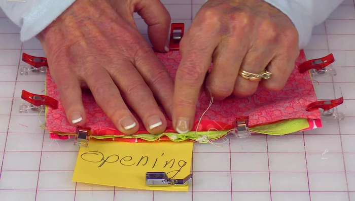 Trim the corners of the fabric, being careful not to cut into the stitching.