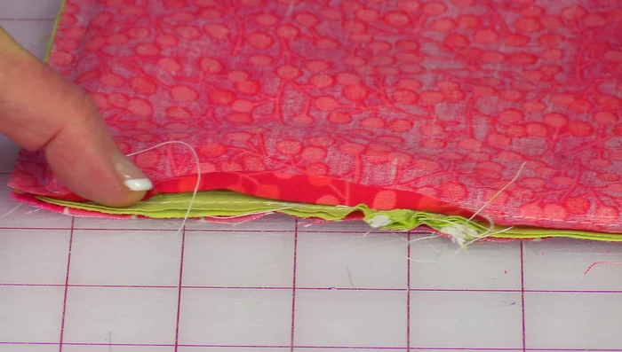 Close the opening with a whip stitch or ladder stitch (video provides a link for ladder stitch).