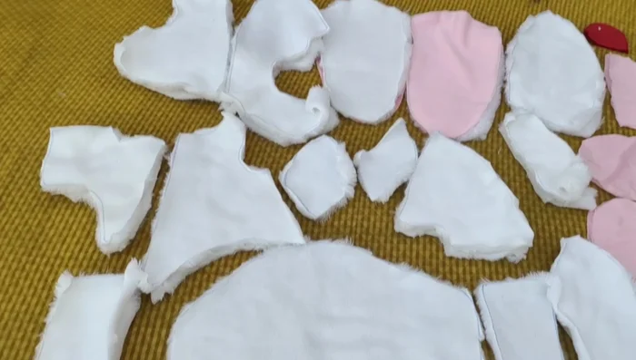 Cut out all the necessary parts for the elephant from fabric of your chosen colors.