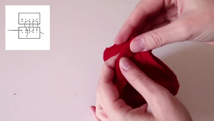 Gathering and sewing the white fabric to create the inner lining of the hat.