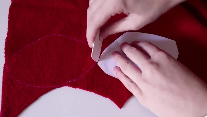 Gathering and sewing the white fabric to create the inner lining of the hat.