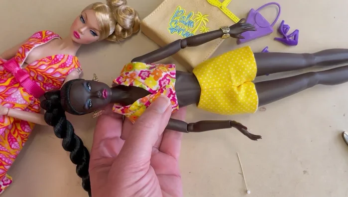 Attach snap and decorative button.