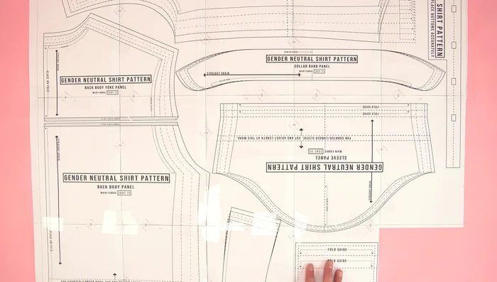 Attach front panels to back panel, press seams, and topstitch.