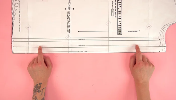 Attach front panels to back panel, press seams, and topstitch.