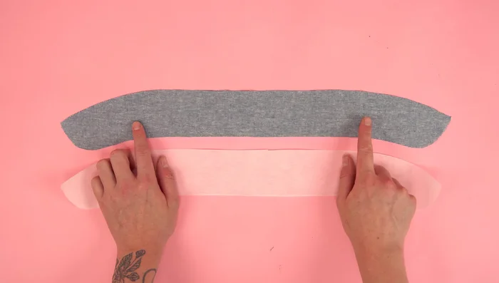 Attach collar assembly to neckline, press, and topstitch.