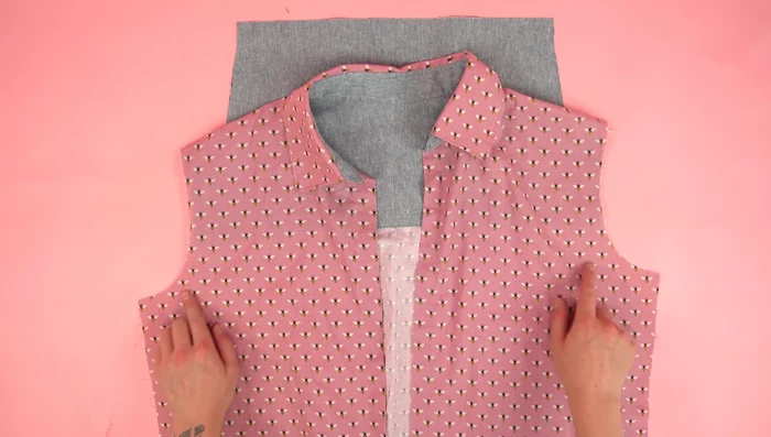 Stitch side seams, serge or zigzag raw edges, and topstitch.