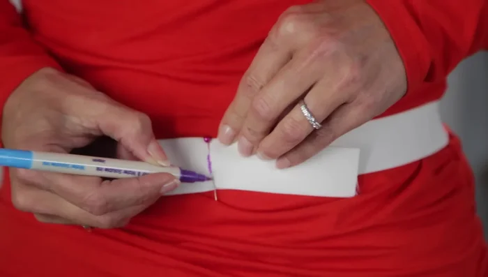 Zigzag stitch the elastic to the fabric, stretching the elastic as you sew. (1.4 length, 3.5 width)