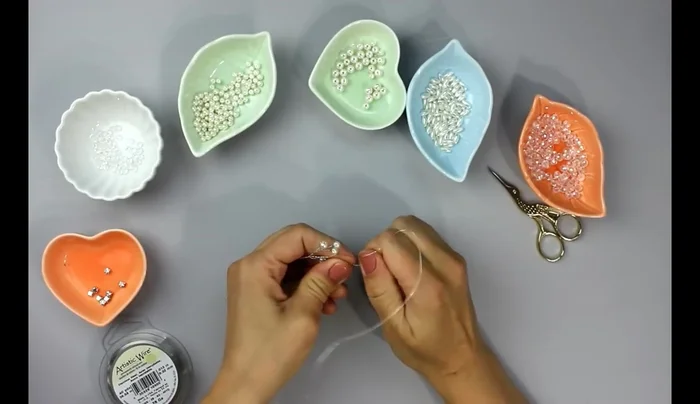 Repeat step 6 until all five rows of beads are added to the branch.