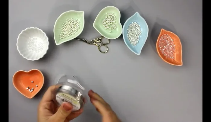 Create a base loop by twisting the wire.