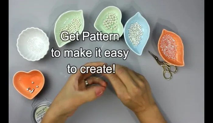 Create the first branch: twist the wire around the bead six to seven times.