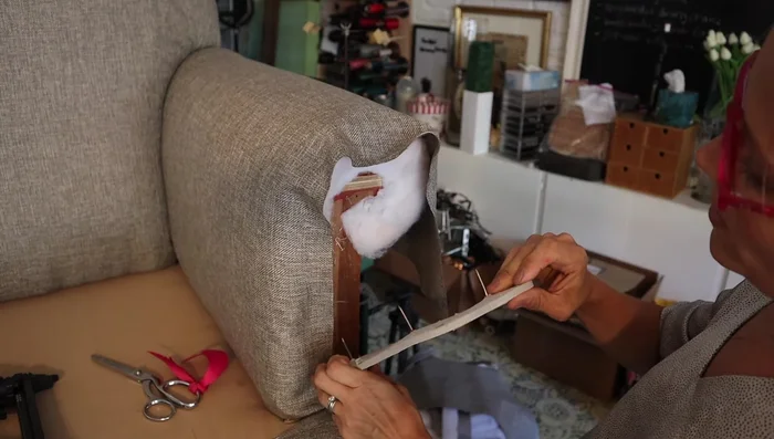 Close the outside arm. Use a scrap piece of fabric to stabilize the side.