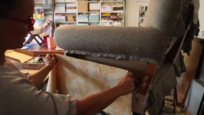 Close the outside arm. Use a scrap piece of fabric to stabilize the side.