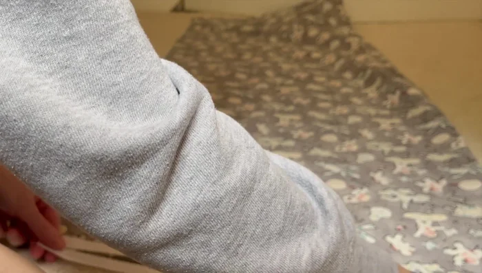 Sew the zipper onto one side of the fabric.