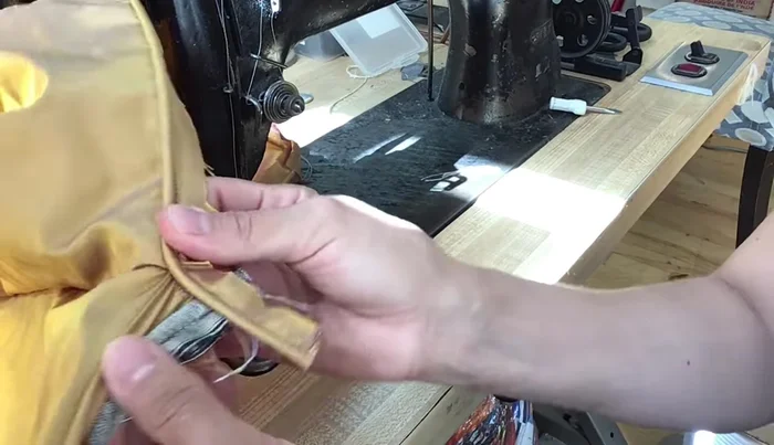 Sew the skirt to the seat.