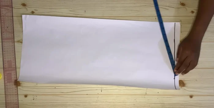 Measure your round armhole measurement divided by two on the cuff line, add seam allowance, and connect.