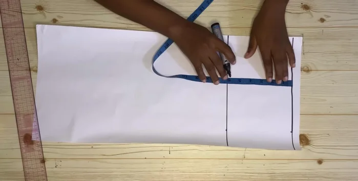 Measure your round armhole measurement divided by two on the cuff line, add seam allowance, and connect.