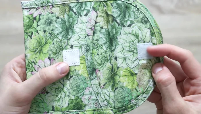 Attach the second piece of velcro to the other flap.