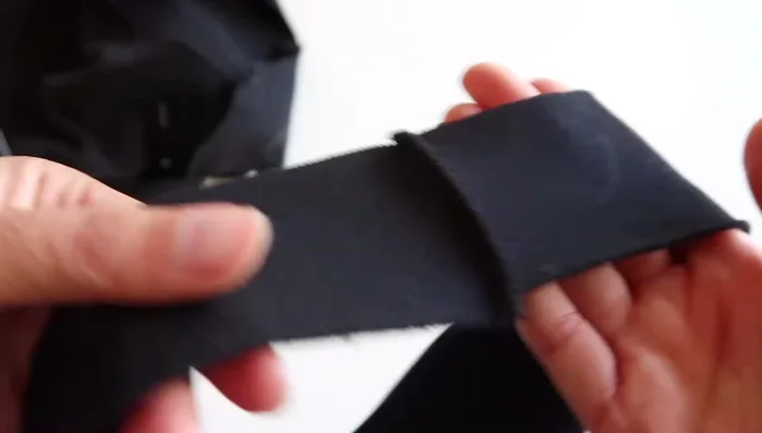 Sew the binding: Sew the binding to the armholes, taking care to avoid bulky seams.