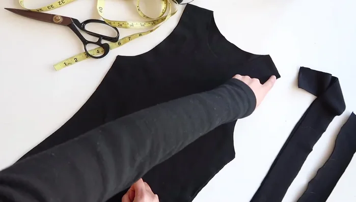 Try on and adjust: Try on the tank top to check the fit and adjust as needed. You can cut it slimmer, but remember the ribbing will add to the final width.