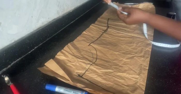 Determine the desired length (26 inches in this example) and mark it on the pattern.